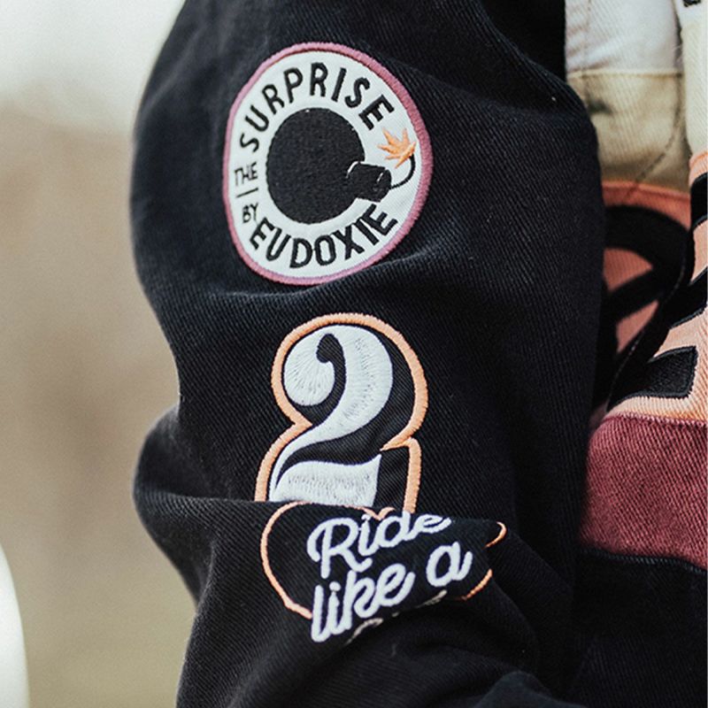 EUDOXIE｜テクニカル レーシング ジャケット｜ファブリック｜ブラック×オレンジ｜モデル着用