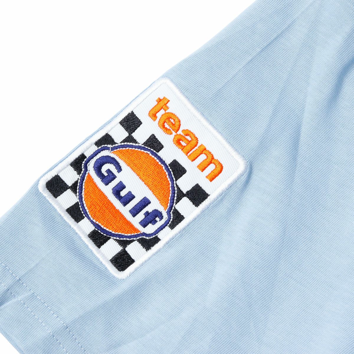 GULF｜ガルフ タイムGULF｜ガルフ タイムレス ヒストリー Tシャツ｜ライトブルーレス GULF｜ガルフ タイムレス ヒストリー Tシャツ｜Tシャツ｜ライトブルーTシャツ｜Tシャツ